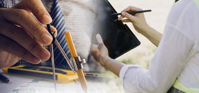 Construction engineer working at blueprint to build large commercial buildings in office. Engineering tools and construction concept.